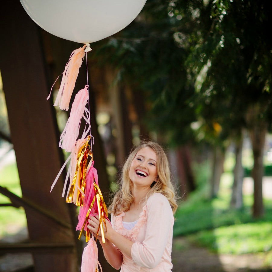 pink and gold balloon tassels